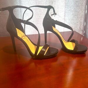 Shimmery black stilettos by Jessica Simpson.